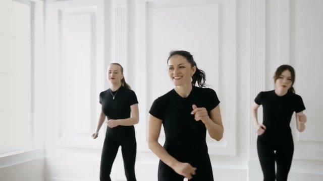 group of girls are engaged in taibo. healthy and sport lifestyle concept