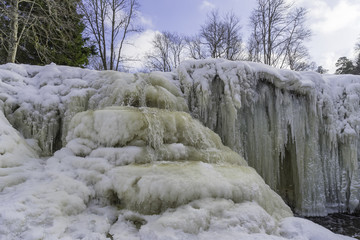 Frozen river at the winter day