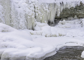 Frozen river at the winter day