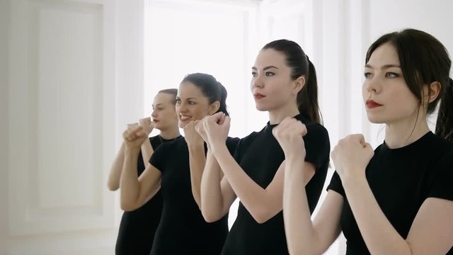 group of girls are engaged in taibo. healthy and sport lifestyle concept