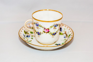 Obraz na płótnie Canvas Elegant vintage cup with saucer for coffee or tea 