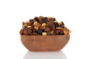 closeup raisins currants and sultanas with candied peel in wood bowl