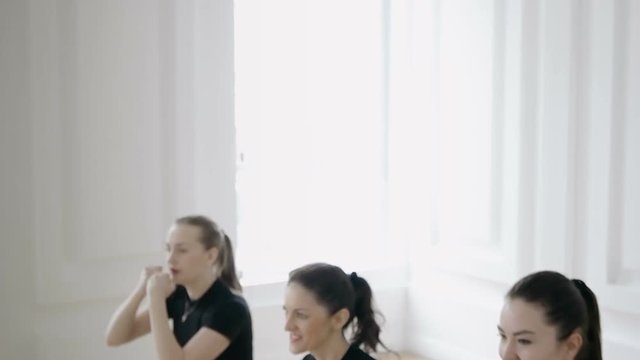 group of girls are engaged in taibo. healthy and sport lifestyle concept