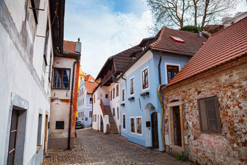 Fototapeta na wymiar Old street and living houses in Cesky Krumlov, Czech republic