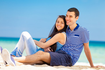 Fototapeta premium in love couple on the sea beach in summertime.