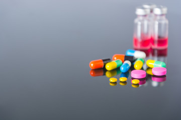 Drug on black glass table