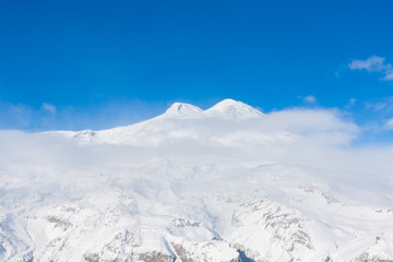 Fototapeta na wymiar Mountain day winter. Elbrus