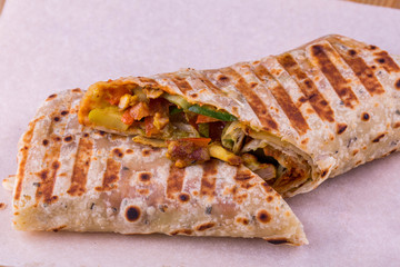 Meat beaters with the vegetables made on a grill