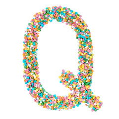 English alphabet letters, numerals and symbols made of little candies