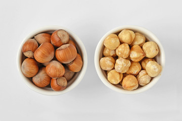 Hazelnuts with and without shell in bowl