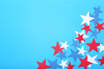 Paper stars on blue background