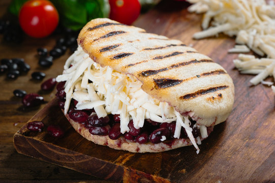 Arepa, corn bread with cheese and black beans