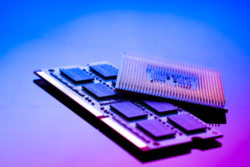 technology cyber electronic concept. cpu ram computer on blue light background