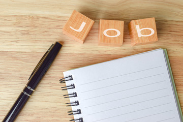Inscription job on the wooden table. Search or choose a job. Looking for a dream job