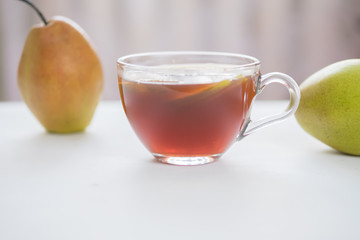 Tea in a Cup with pear slices