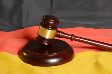 Wooden Gavel on German flag background