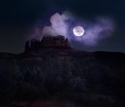 Cathedral rock in Sedona under a full moon