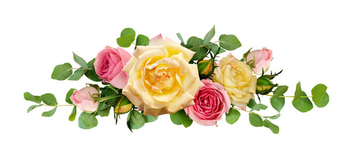 Pink and yellow rose flowers with eucalyptus leaves