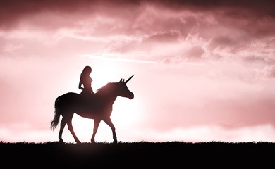 unicorn and girl at sunset © ginettigino