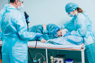Endoscopy at the hospital. Doctor holding endoscope before gastroscopy