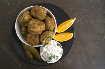 Falafel. Balls of chickpeas deep-fried. on dark background.