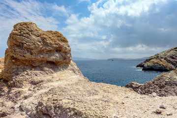 Rocks and sea view in Firopotamos Bay on Milos, Cyclades Islands, Greece.