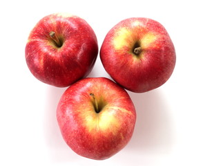 Top View of Three Red Apples Closeup with White Background.