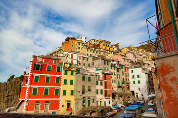 Fototapeta na wymiar View of architecture of Riomaggiore town. Riomaggiore is one of the most popular town in Cinque Terre National park, Italy