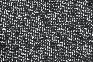 Varicolored tweed like texture, varicolored wool pattern, textured  melange upholstery fabric background copy space.