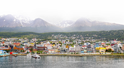 Scenic view of Colourful Town of Ushuaia in the mist. Capital of Tierra del Fuego province in...