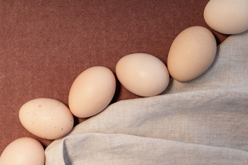 Easter pastel speckled eggs, selective copy space background