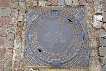 Manhole in the center of old Riga