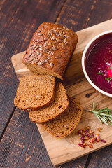 pieces of bread with seeds on a cutting Board