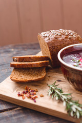 pieces of bread with seeds on a cutting Board