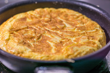 Spanish omelette in the pan, cooking spanish omelette