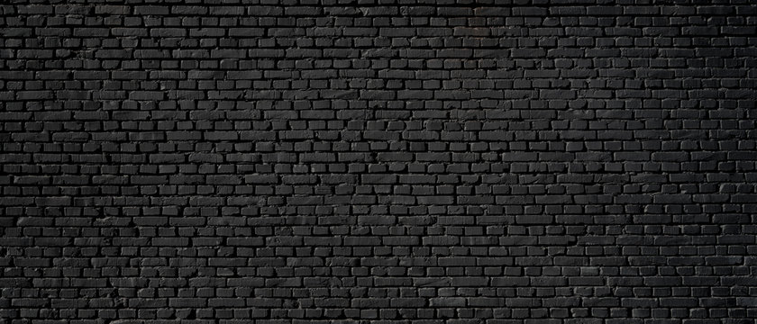 Black wall as background, texture of a black brick wall