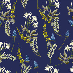 Fototapeta na wymiar Spring seamless pattern of wild flowers for textile design
