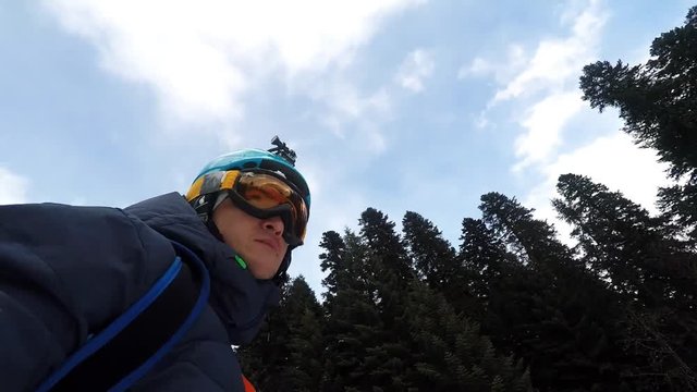 man rides on a snowboard