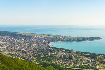 Fototapeta na wymiar The view from the Markotkh mountain range in the Central and Eastern part of the city of Gelendzhik, a Thick Cape of Gelendzhik Bay of the Black sea