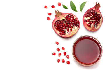 Pomegranate juice with pomegranate isolated on a white background top view