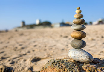 Fototapeta na wymiar Balance stones on the beach