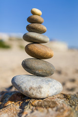 Fototapeta na wymiar Pile of stones on the beach
