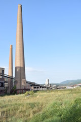 Old factory building with silos © mirzamuradbasic