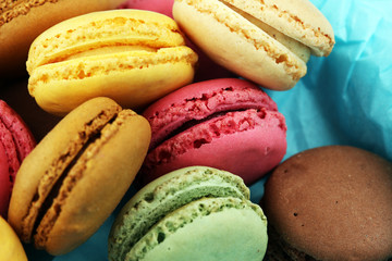 Different types of macaroons or macarons in a box