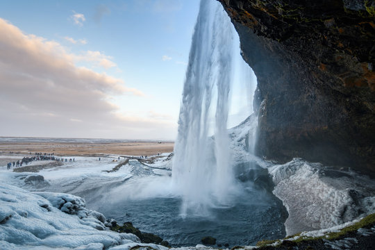 behind seljalandsfoss waterfall in Iceland