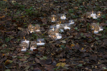 The candles are on the ground