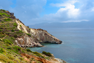 Fototapeta na wymiar Beautiful coast of Milos island with view of Fourkovouni bay. Cyclades, Greece.