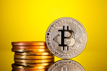 Shiny silver bitcoin stack closeup