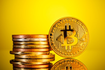 Shiny golden bitcoin stack closeup