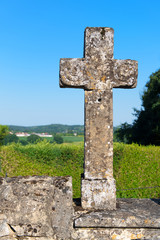 Old stone cross in landscape